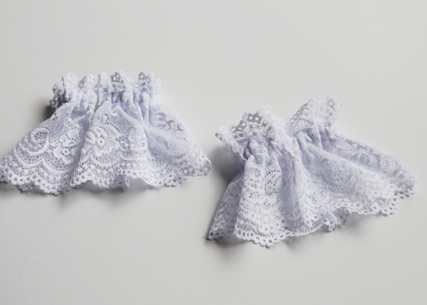 Pair of white lace cuffs
