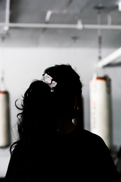 Reflective sports scrunchie with a secure hold