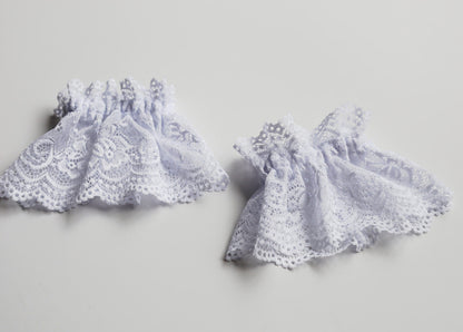 Pair of white lace cuffs