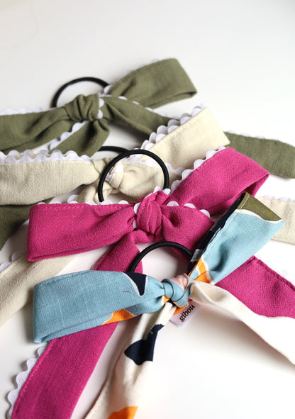 Boucle sur élastique avec bordure