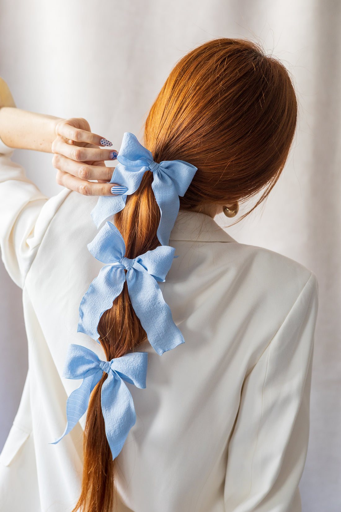 Imparfait - Boule sur crochet métallique bleu bébé