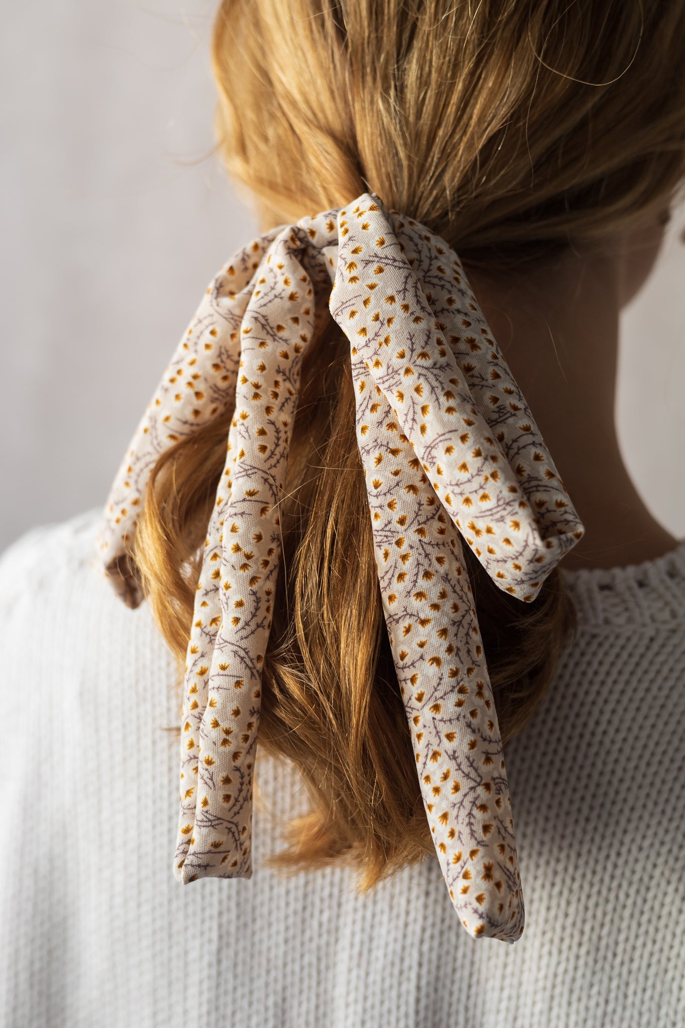 Échantillon - Boucle sur élastique trait floral